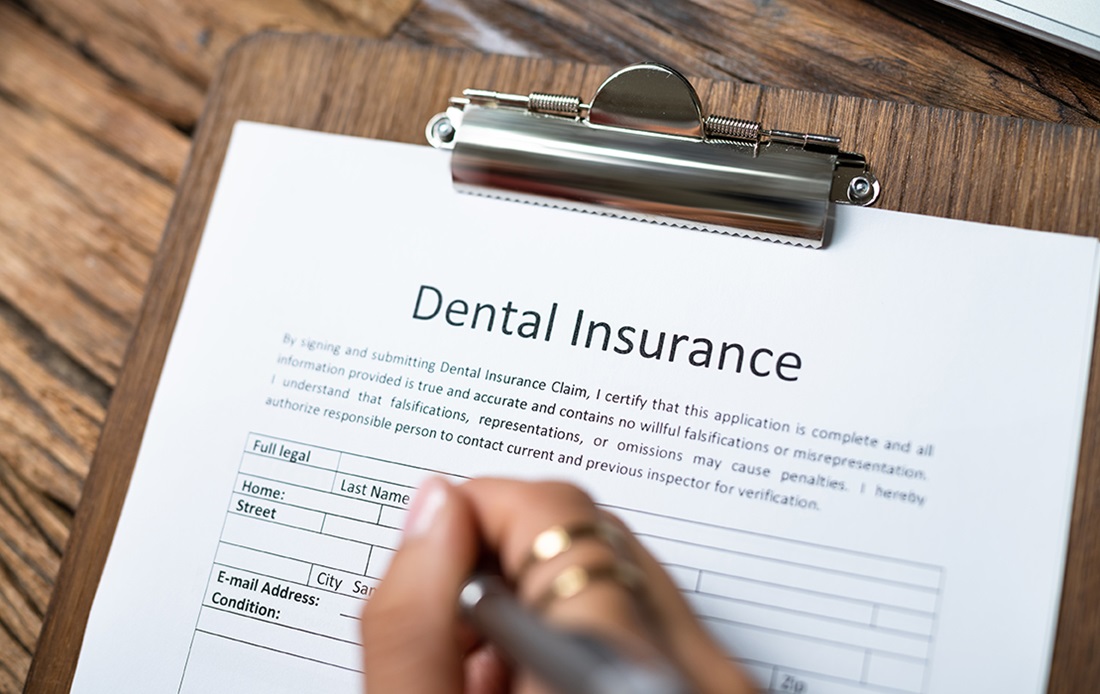 Clipboard with the words Dental Insurance