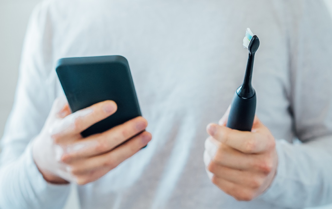 Person looking for an app to brush their teeth
